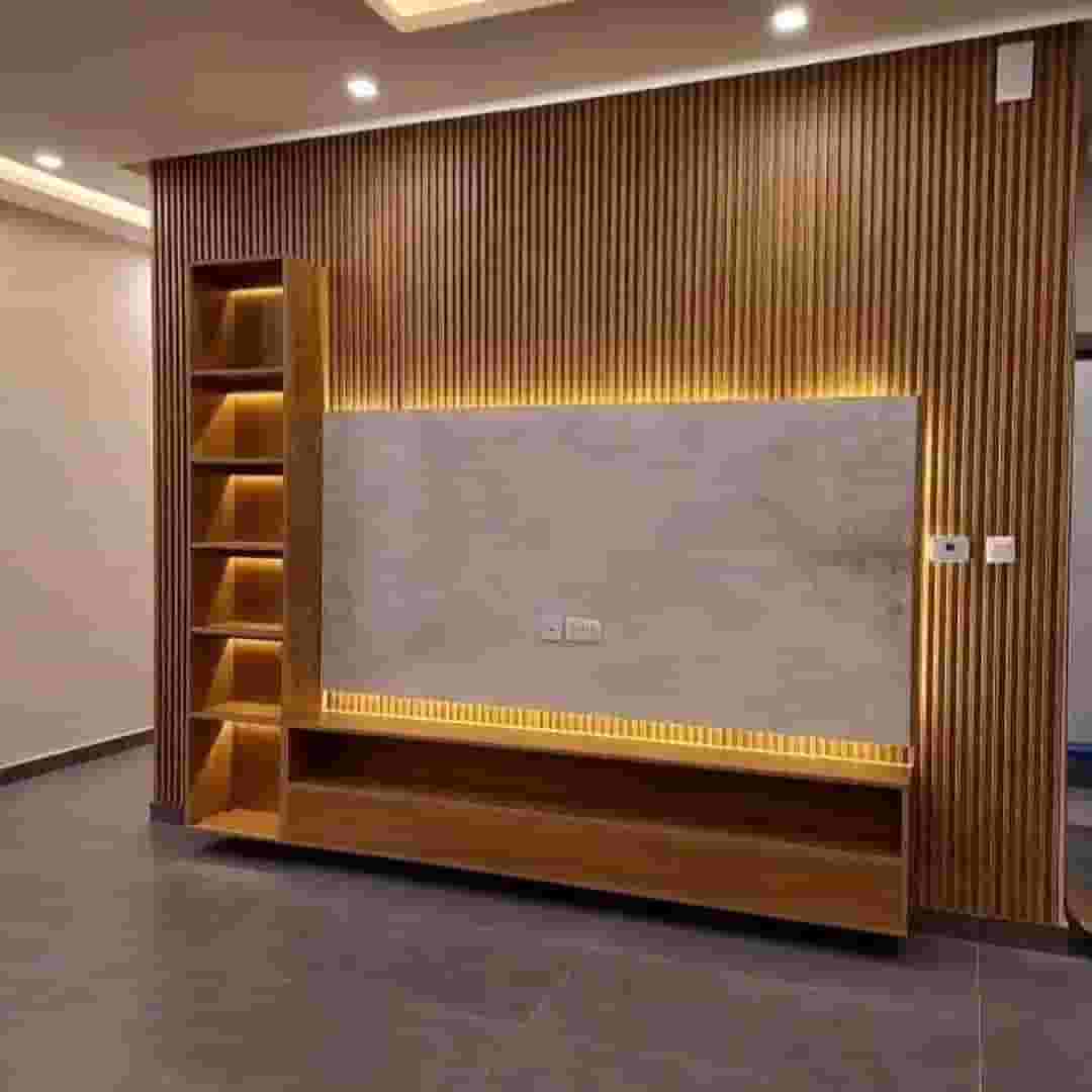 Carpenter manufacturing and repairing the sofa