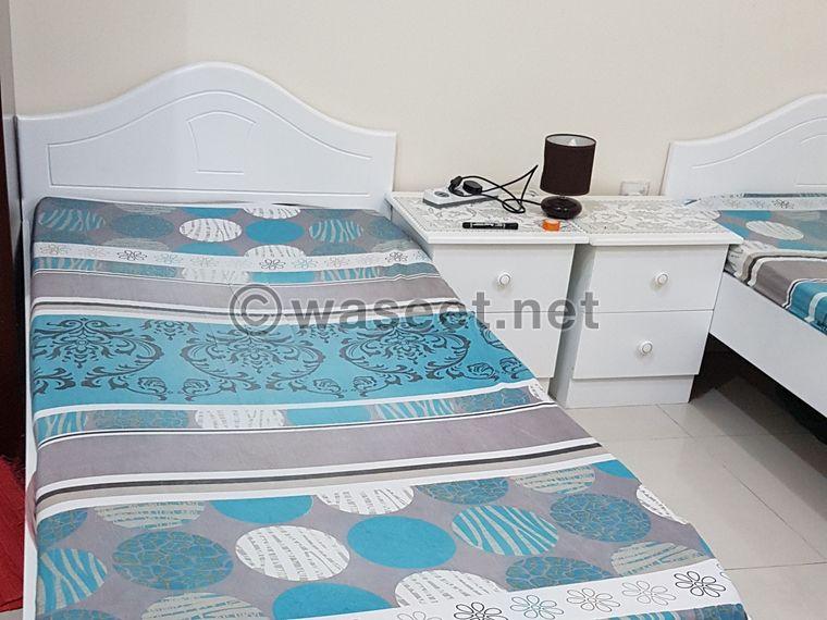 3 beds with mattresses and two tables for sale  0