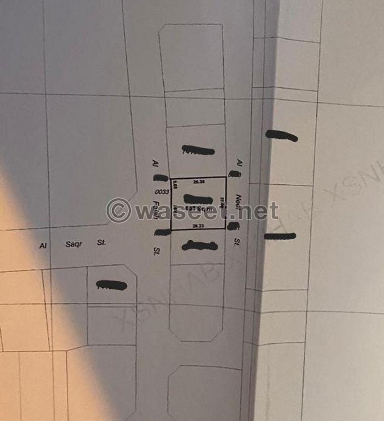 Al Khor for sale land for two streets in front and back  0
