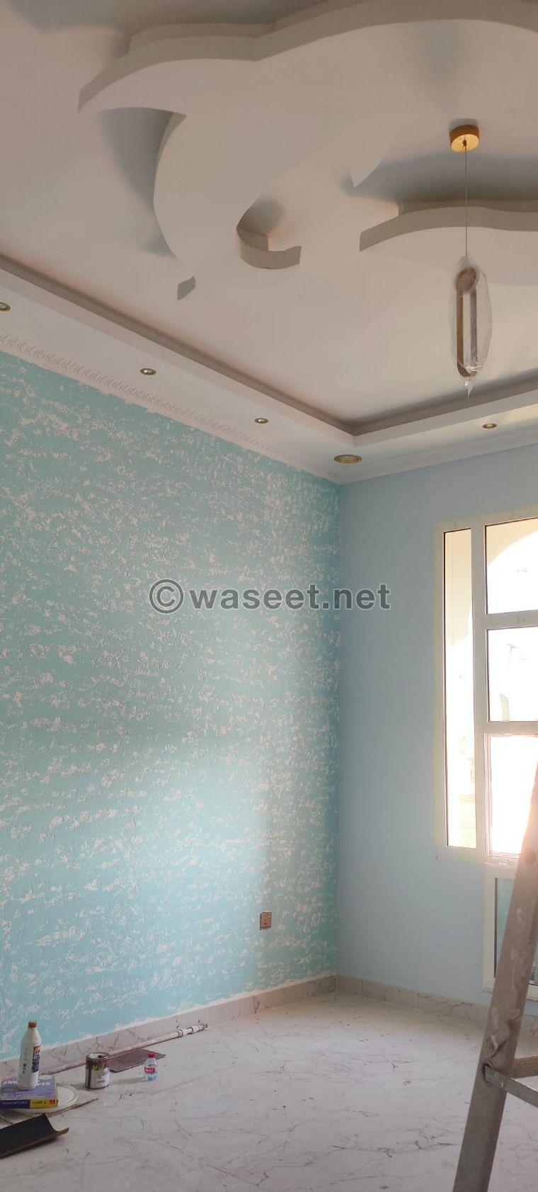 Painting the walls of buildings and villas 2