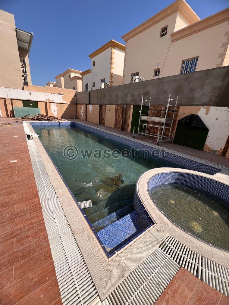A service villa for rent in Duhail with a swimming pool  3